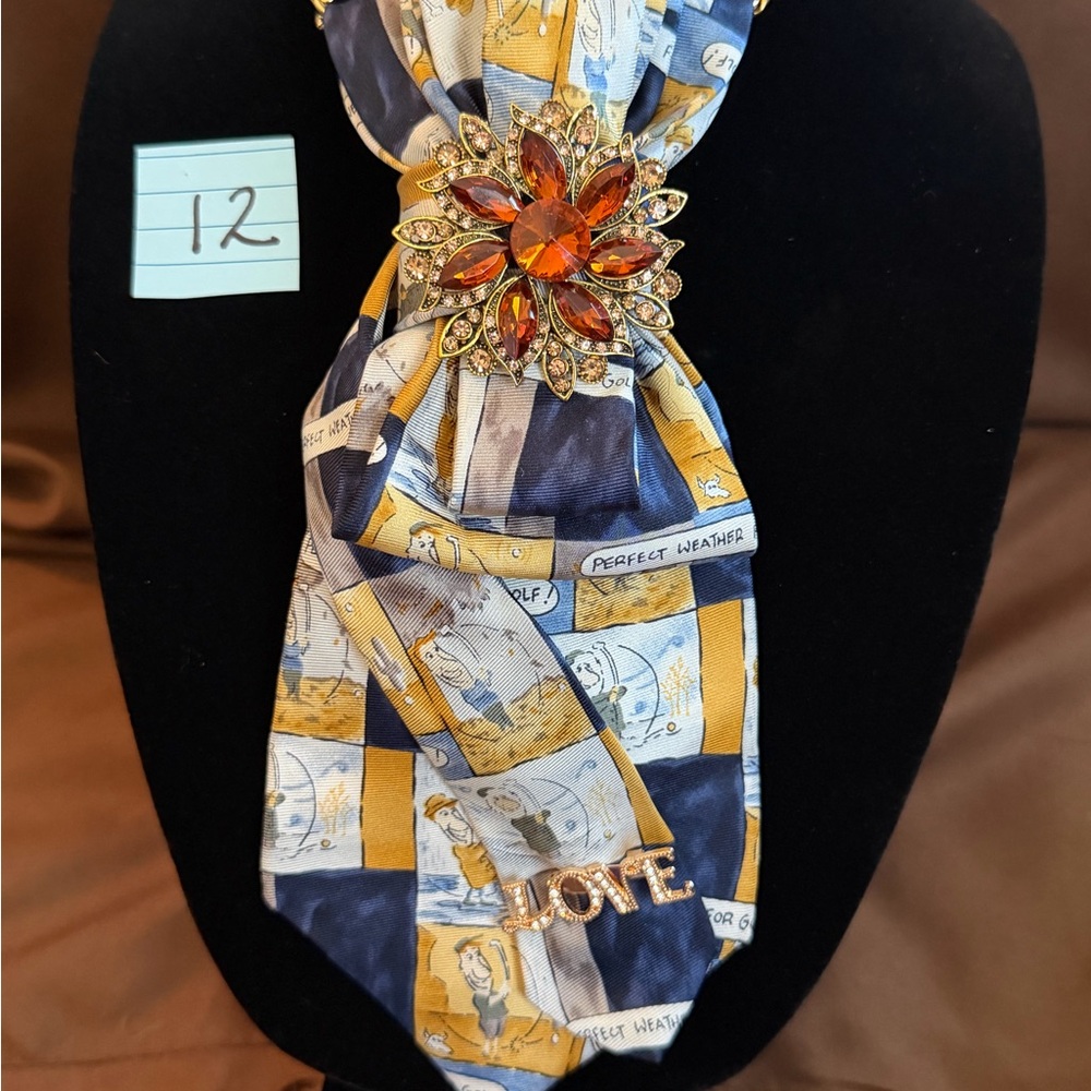 Navy and Gold Patterned Silk Scarf Tie with Decorative Brooch